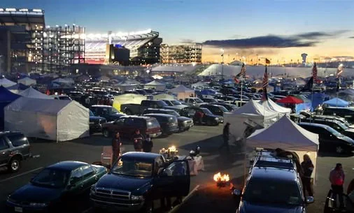 Gillette Stadium parking and tailgating at dusk - World Cup 2026 match day crowds